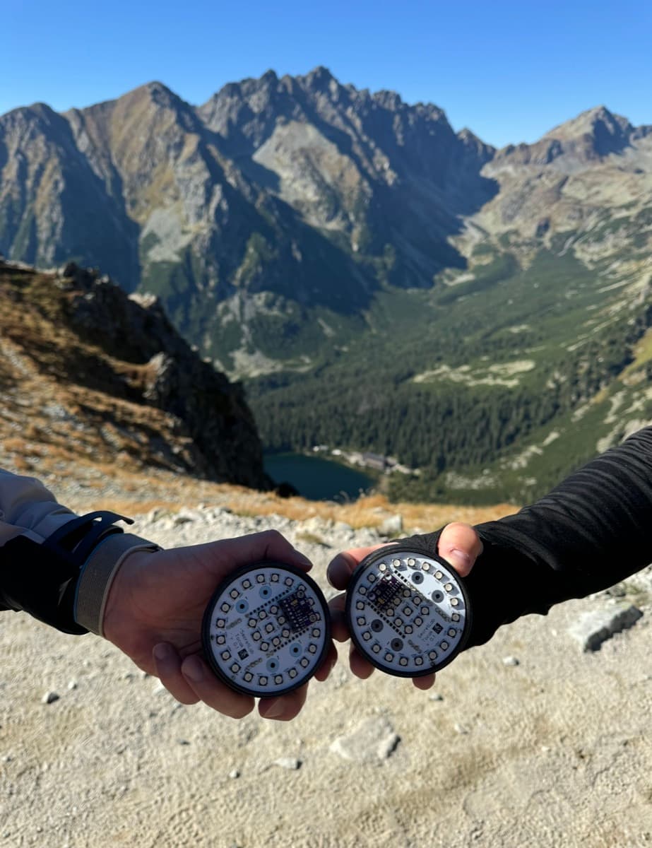 two aura prototypes held together above a tatra valley